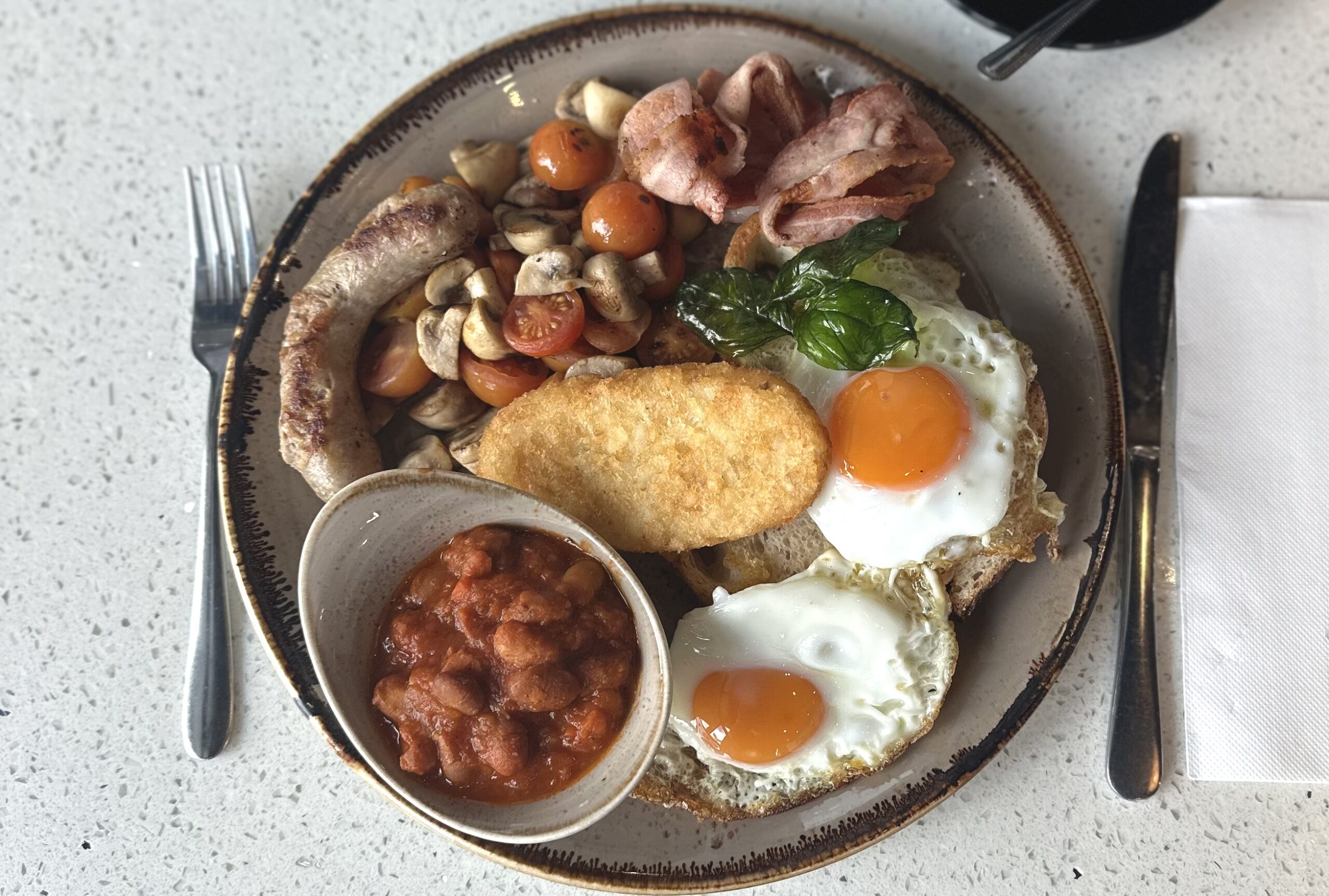 Garibaldi big breakfast with eggs, bacon, sausage, mushrooms, tomatoes and hash brown